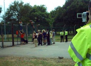 Fence climbing practice at AWE Aldermaston. Police filming while they wait for back up.
