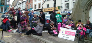 Knitting round the clock tower in Knighton on 30th March 2013