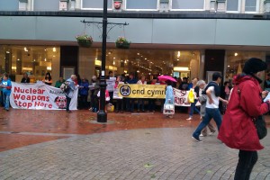 Sheltering from rain but still singing