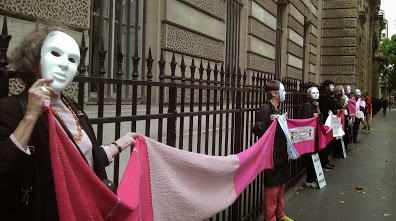 Wool Against Weapons pink scarf in France